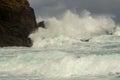 Huge waves crashing on the rocks